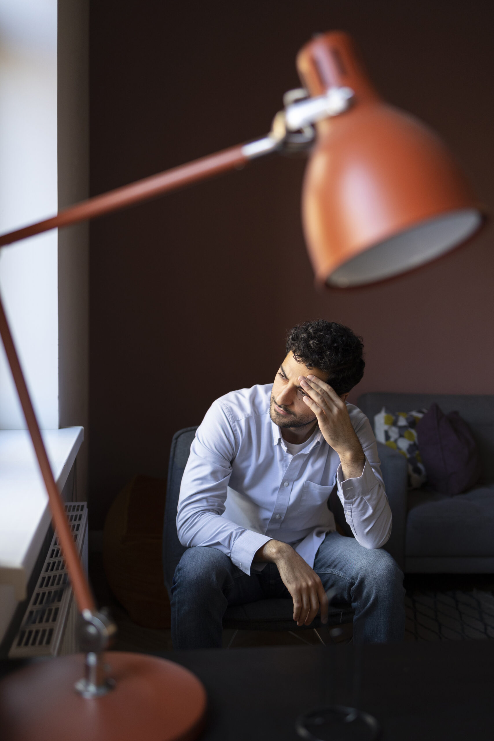 https://misticusmind.com/wp-content/uploads/2025/04/anxious-man-indoors-full-shot-scaled.jpg